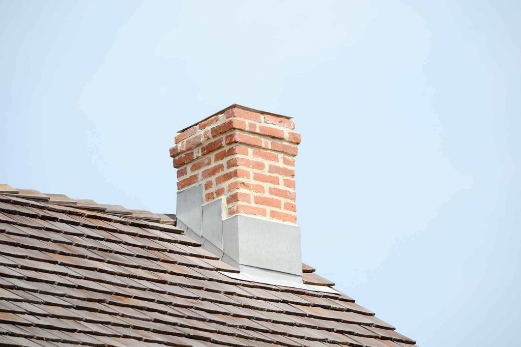 How to Fix a Leaking Roof Around Chimney